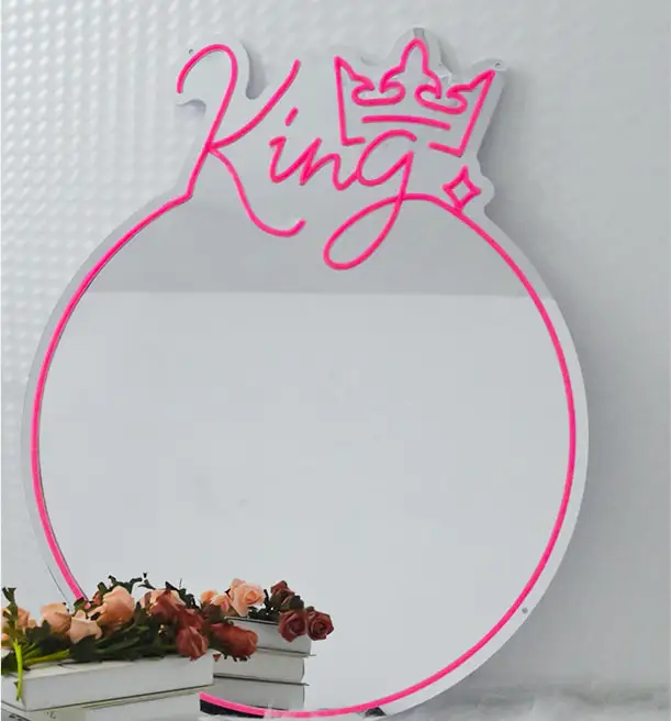 silver mirrored neon sign