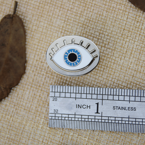 Blue Eye enamel pins
