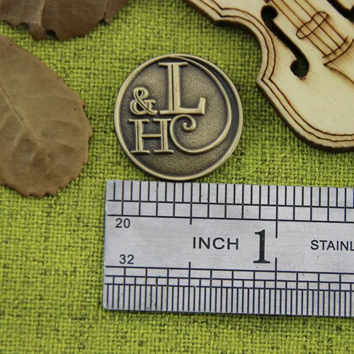 L and H Lapel Pins