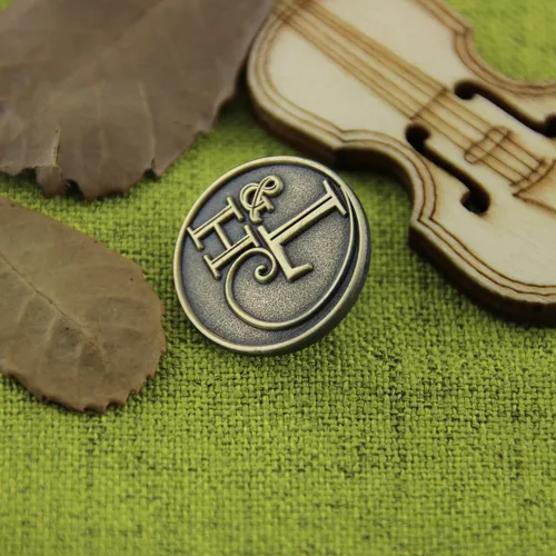 L and H Lapel Pins