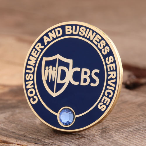 DCBS custom enamel pins