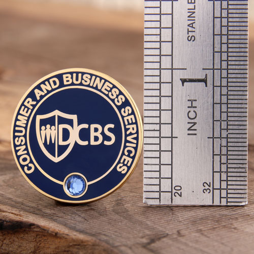 DCBS custom enamel pins