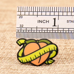 A Peach with Tape Lapel Pins