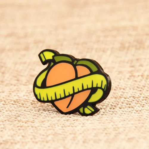 A Peach with Tape Lapel Pins