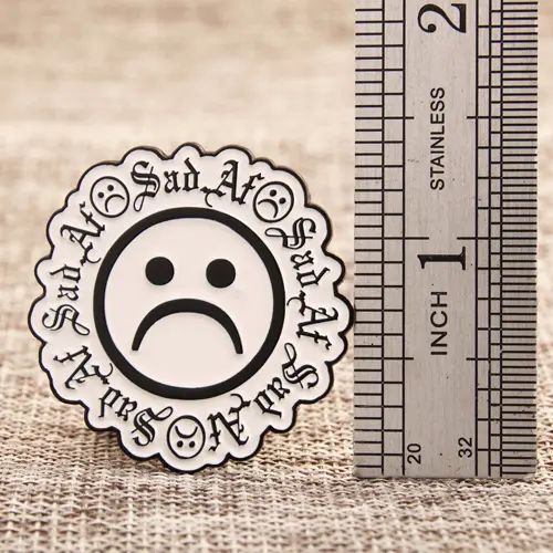 Sad face lapel pins