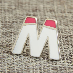 Custom “M” pins